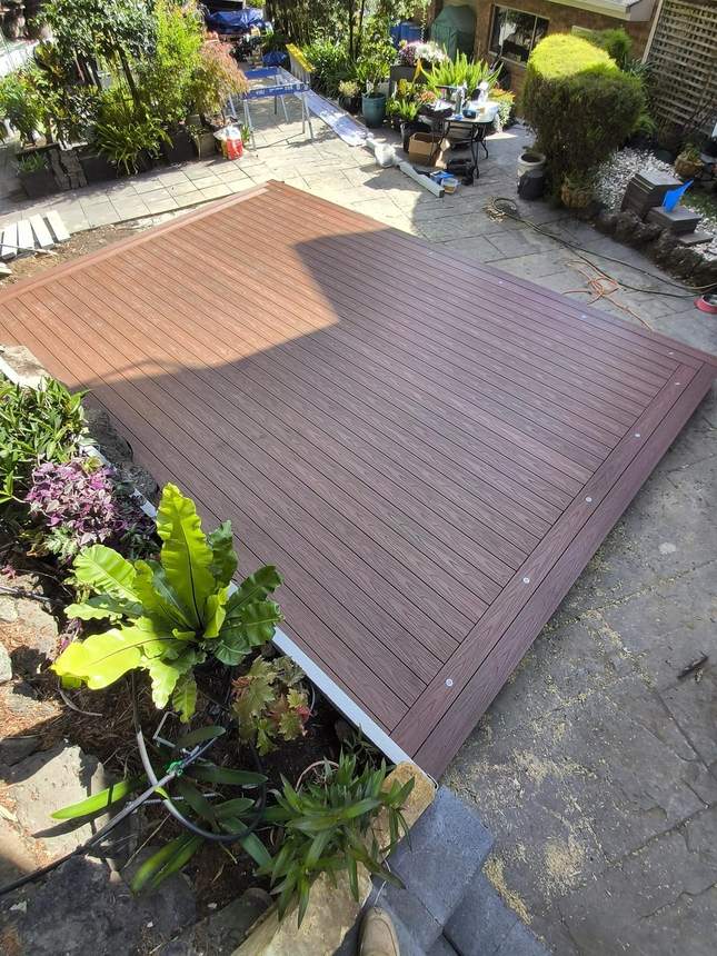 Aerial view of completed Templestowe outdoor transformation — herringbone deck and louvred pergola